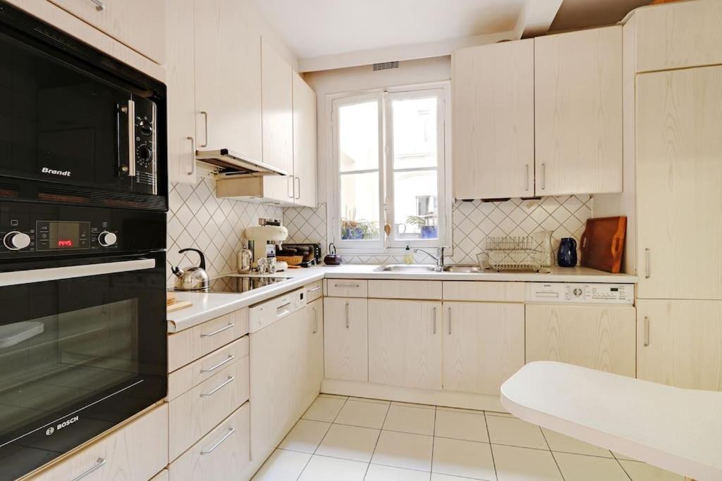 Sejour Au Pied De La Tour Eiffel Apartment Paris Bagian luar foto